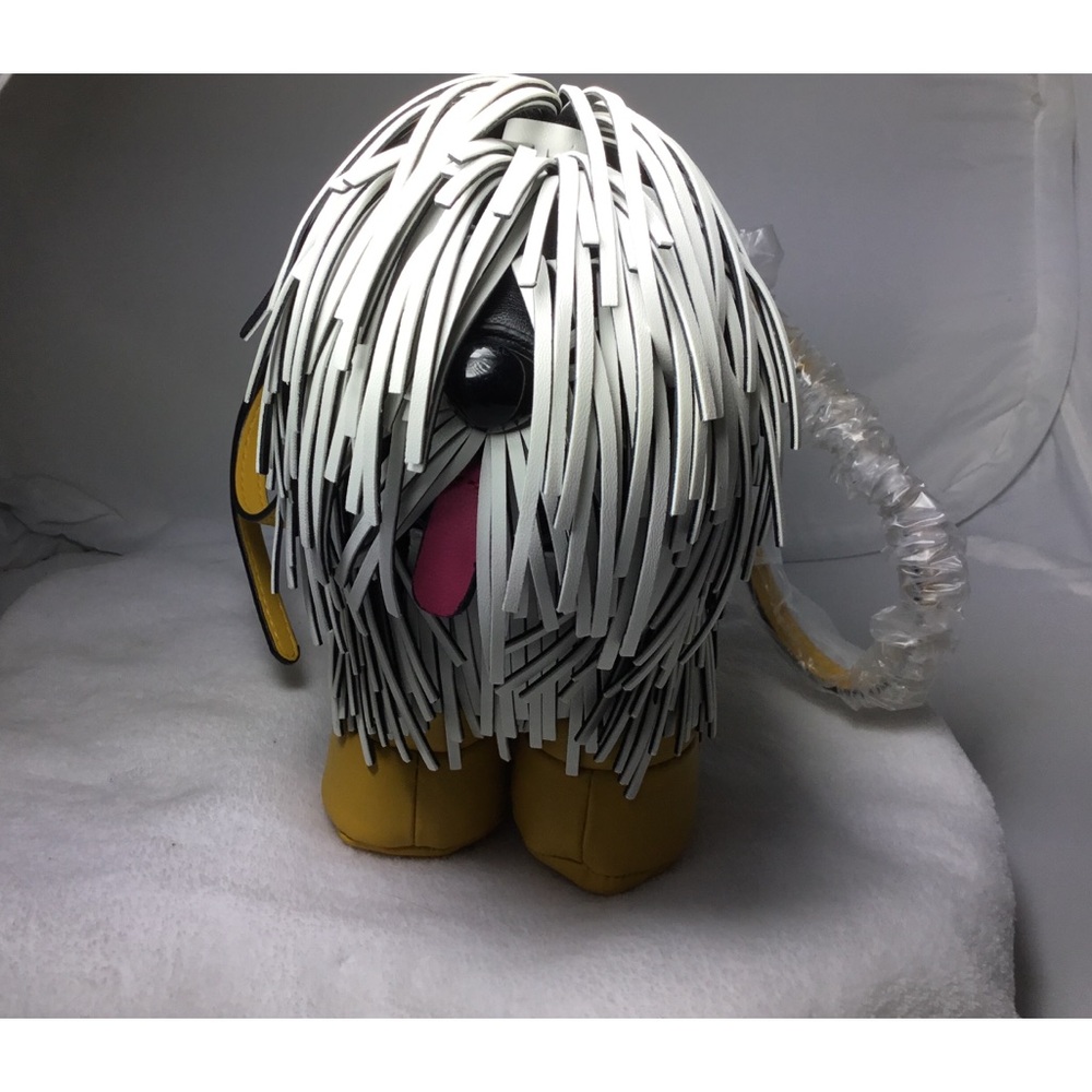 Last mopp haired dog…real leather